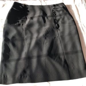 Women black mini skirt. Nine West band. Size 4